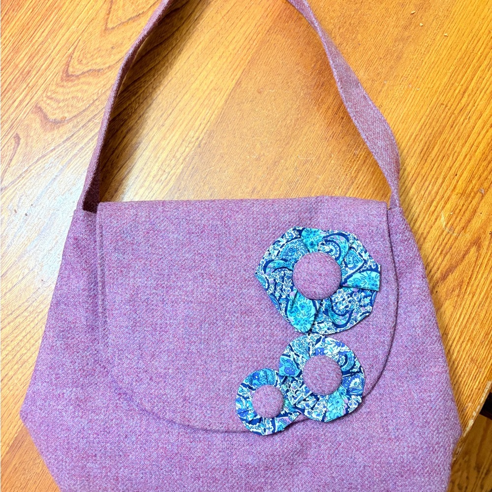 Ladycrow silks brand shoulder bag with blue accents